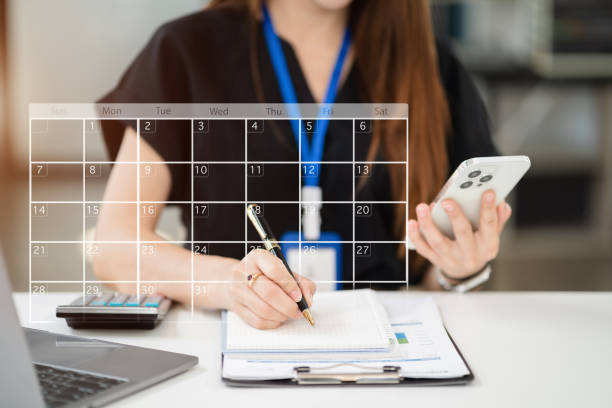 istock Business woman using digital smartphonewith calendar planner and organizer to plan and reminder, schedule, timetable, and management, event planning. 1755211977