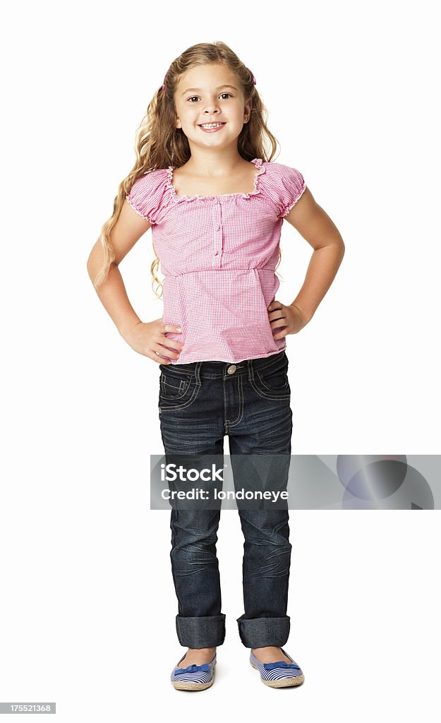 Kleines Mädchen lächelnd mit Händen auf den Hüften-isoliert - Lizenzfrei Kind Stock-Foto