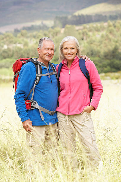 istock Senior Couple On Hike Through Beautiful Countryside 175521502