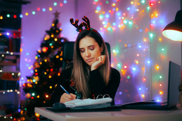 istock Happy Office Worker Spending the Christmas at the Workplace 1755215835