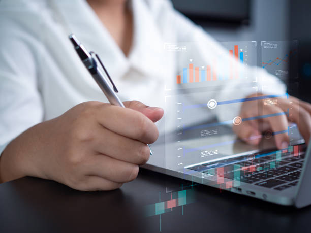istock Businesswoman using computer to analyze business and manage corporate data represents business analysis with charts and indicators to improve organizational performance. 1755220260