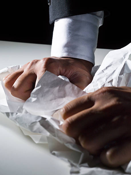 istock Man crumples up a piece of paper 175522071