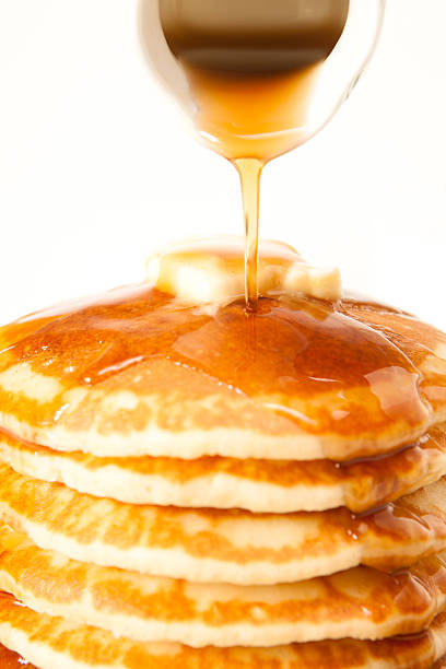 Pouring syrup stock photo