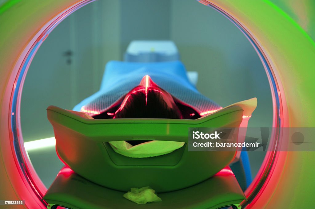 Patient laying on a CT scan platform "Health series:Tomography Tunnel-PET/CT, Rear ViewTo see my other photos please click here:" MRI Scan Stock Photo
