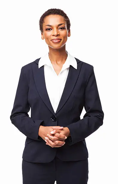Portrait of a confident African American female executive. Vertical shot. Isolated on white.
