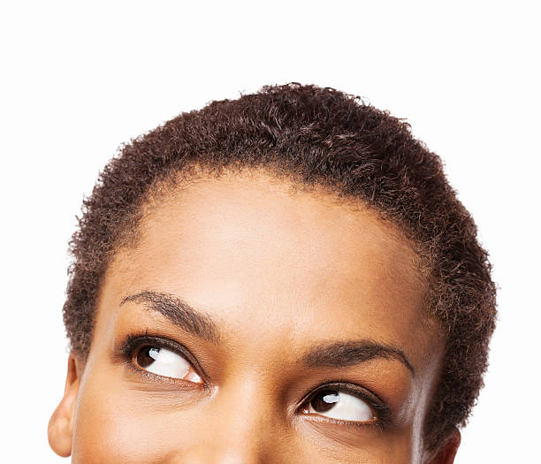 African American Woman Looking Up - Isolated stock photo