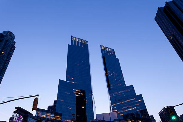 Columbus Circle New York City View of Time Warner Center at Columbus Circle during dusk in New York City. time warner center columbus circle pictures stock pictures, royalty-free photos & images