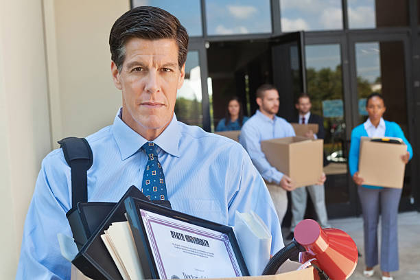 istock Mature unemployed man leaving office after layoff or being fired 175524466