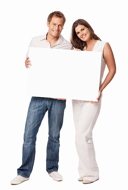 istock Couple Holding a White Blank Sign - Isolated 175525001