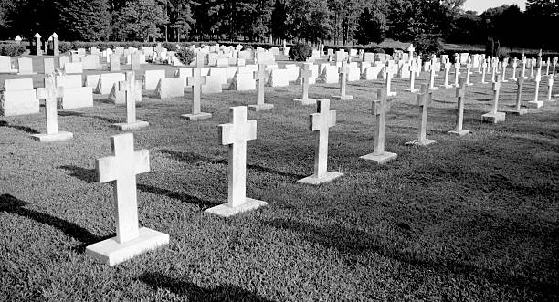 istock Rows of unmarked grave stones in black and white 175525152