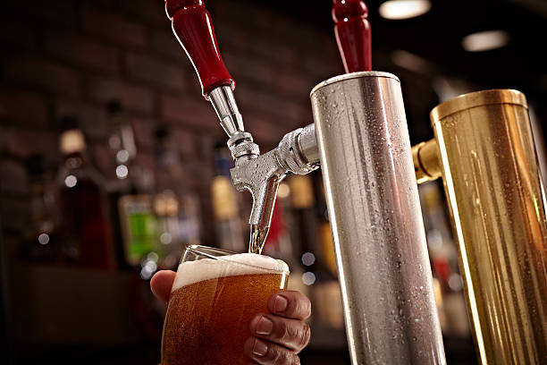 Beer Tap and Pint stock photo
