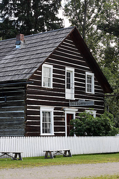 Cottonwood House Historic Site "A photograph of the Cottonwood House Historic Site Roadhouse located in British Columbia, Canada.  Cottonwood House is one of the last remaining roadhouses in British Columbia.  It was built in the 1860aas to offer accommodation, meals and provisions to miners and travellers on their journey along the Cariboo aEWaggonaa Road to Barkerville or Quesnel." quesnel stock pictures, royalty-free photos & images