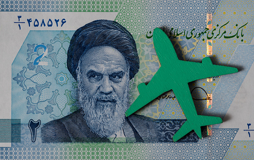 Symbolic plane against the background of Iranian banknotes