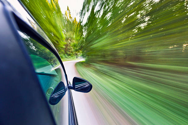 istock Car speeding on country road 175526127