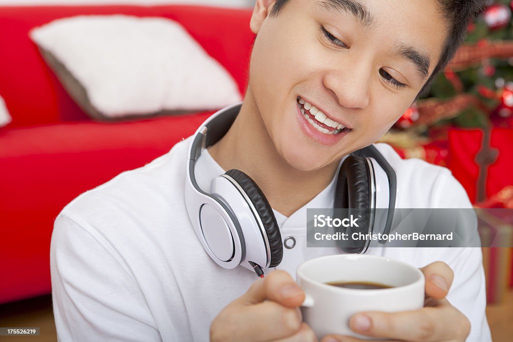 Smiling male with cup of coffee Happy male drinking coffee 20-24 Years Stock Photo