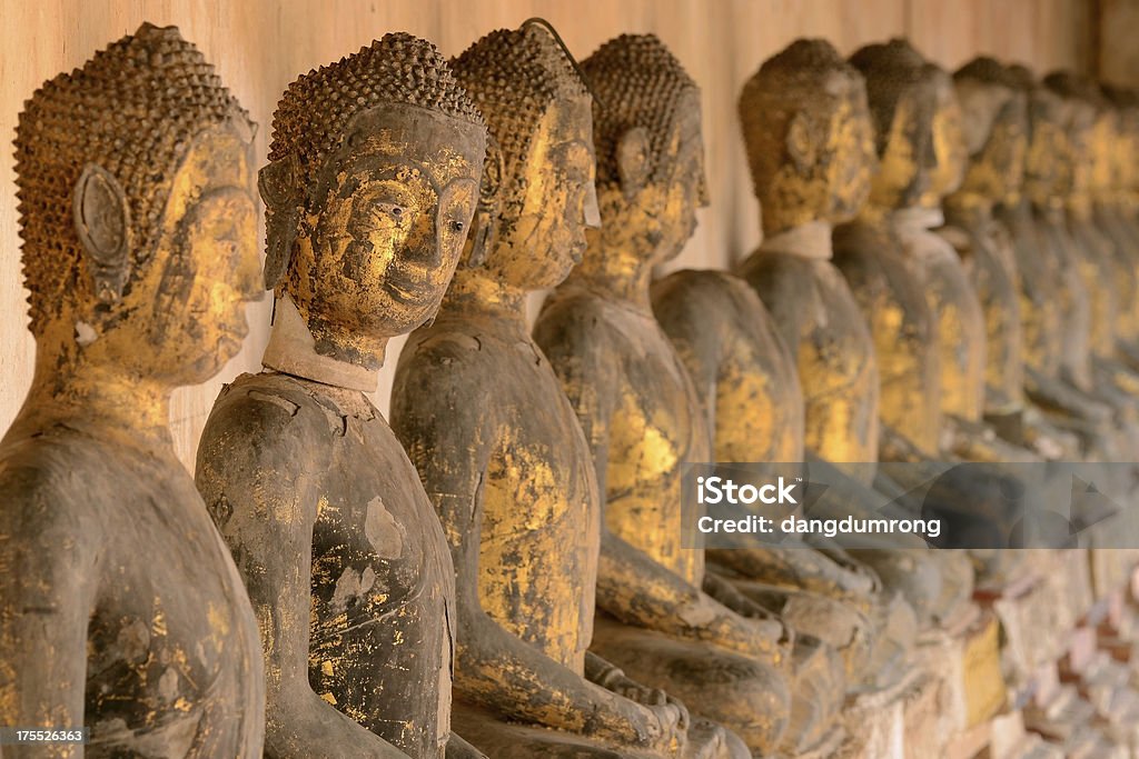 Buddha looking at Wat Khanon Ratchaburi Province, Thailand "Row of Buddha looking at Wat Khanon Ratchaburi Province, Thailand" Ancient Stock Photo
