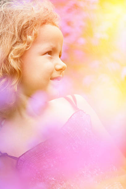 Portrait of a smiling girl with flowers