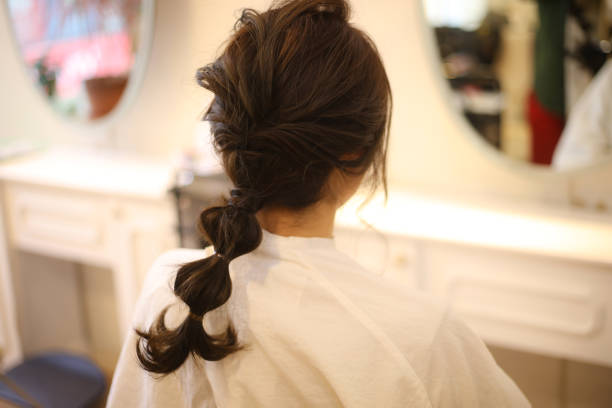 istock Woman's back view beauty salon image 1755274170