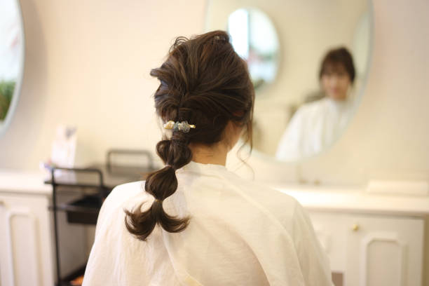 istock Woman's back view beauty salon image 1755274709