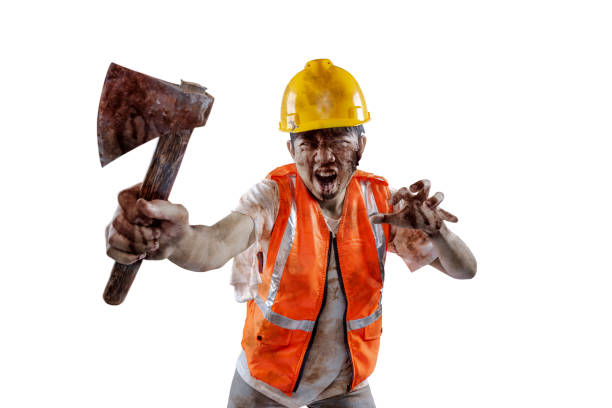 istock A scary construction worker zombie with blood and wounds on his body walking while carrying an axe 1755275784