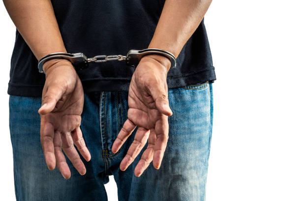 istock Arrested man with a handcuff on his hand 1755277380