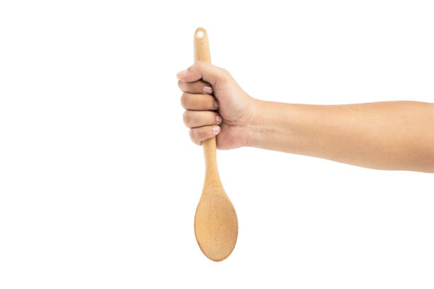 Wood bean or bamboo ladle spoon in rustic, vintage style, white background, isolated perfect for artwork, selective focus
