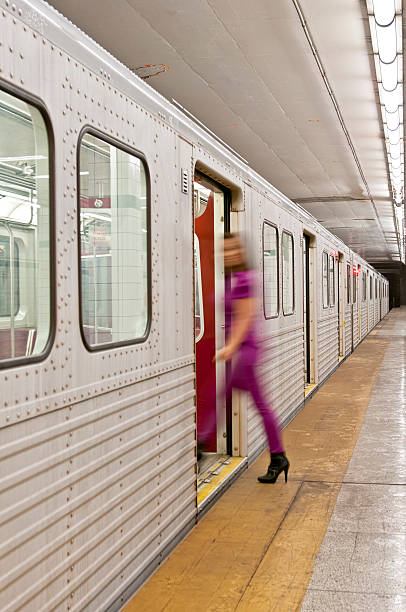 istock Passengers getting in and out from the subway train (IV) 175528408
