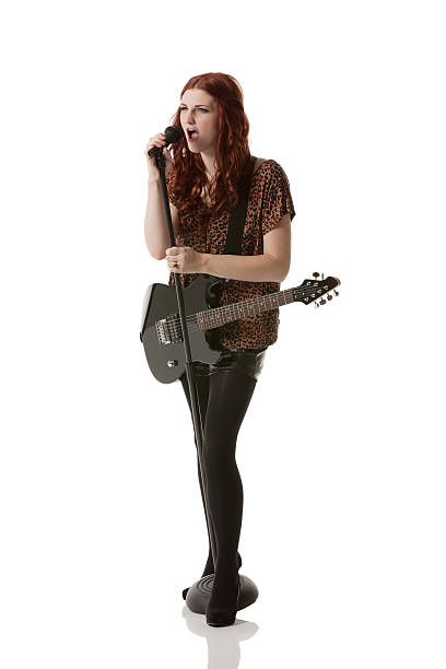 istock Woman singing into a microphone 175528648
