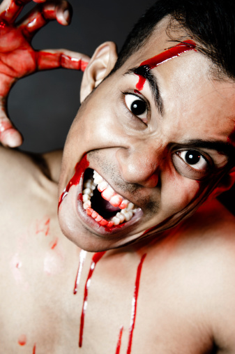 horror scene with blood dripping on the face
