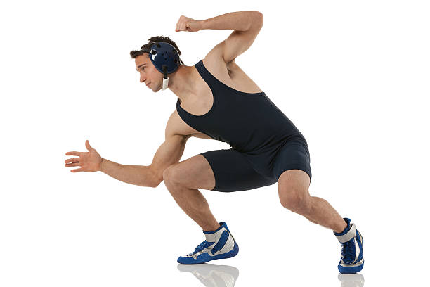 Wrestler in action Wrestler in actionhttp://www.twodozendesign.info/i/1.png wrestling sport stock pictures, royalty-free photos & images