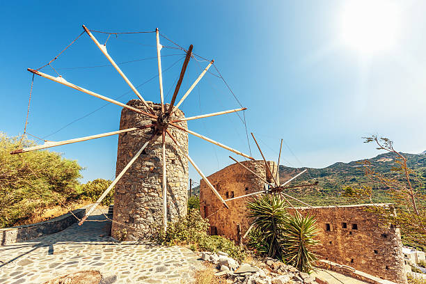 Traditional Windmill, Greece "Windmills in the mountain landscape of Crete, Greece." herakleion photos stock pictures, royalty-free photos & images