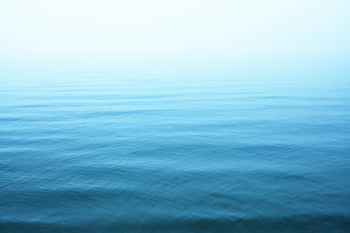 Ripples on blue water surface