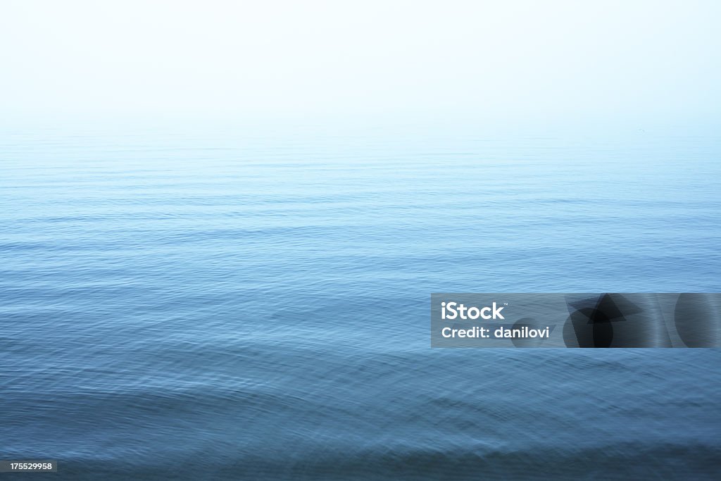 Ripples on blue water surface Same photos and more you can find here: Sea Stock Photo