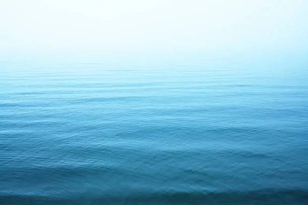 Photo of Ripples on blue water surface