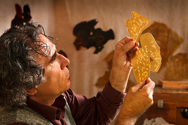 Shadow Puppet Maker Master of the Turkish Shadow Puppet Tradition, Karagoz and Hacivat. hacivat karagoz stock pictures, royalty-free photos & images