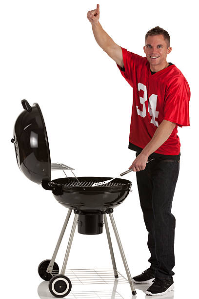 istock Sportsman cooking at barbecue 175530989