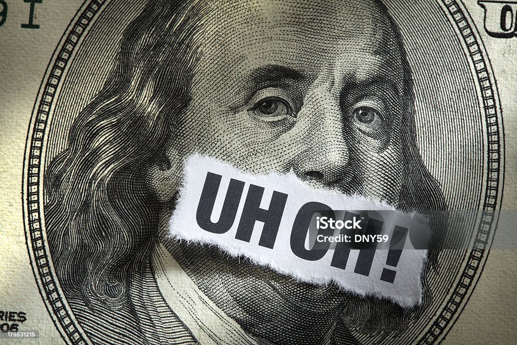 One Hundred Dollar Bill with word Inflation Printed on it A debt concept.To see more of my financial images click on the link below: Mistake Stock Photo