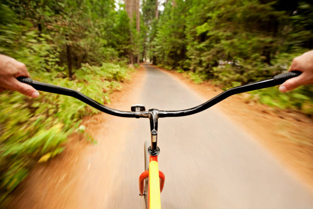 Man cycling on mountain road