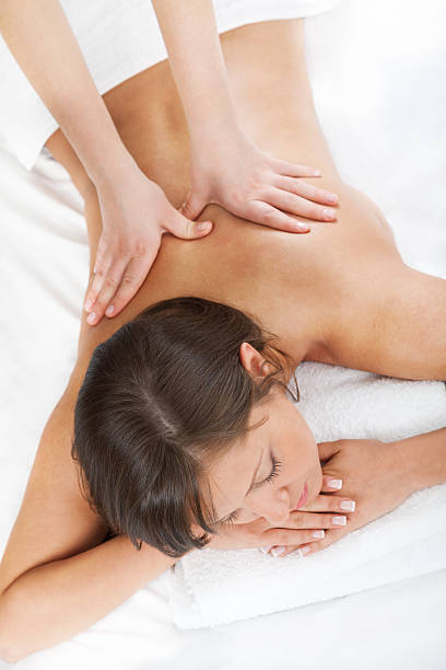 istock Young woman having massage 175531984