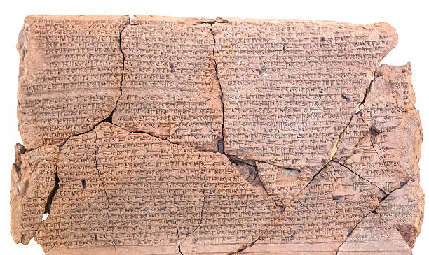 istock old letters - cuneiform writing on clay tablet 175531989