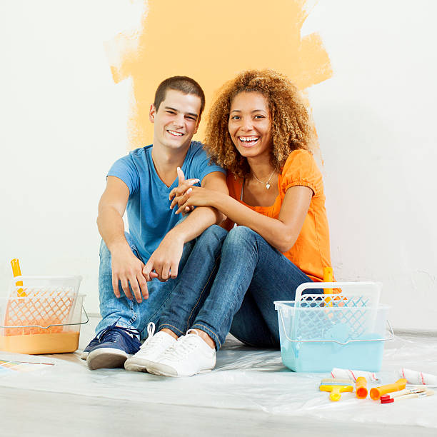 istock Happy Young Couple Painting Their Home 175532449