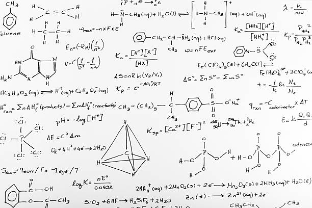 Whiteboard of written complex chemistry work hand written chemistry formulas on a white piece of paper. chemical formula photos stock pictures, royalty-free photos & images