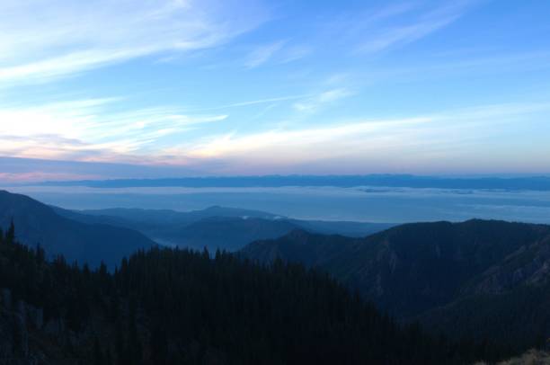 istock Mountains ridges under the clouds at sunset 1755327284