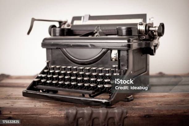 Vintage Black Manual Typewriter On White Background Stock Photo - Download Image Now