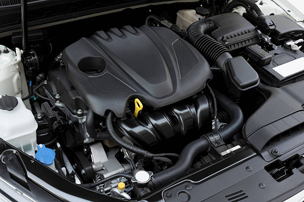 Modern Car Engine Car engine under the hood. engine stock pictures, royalty-free photos & images