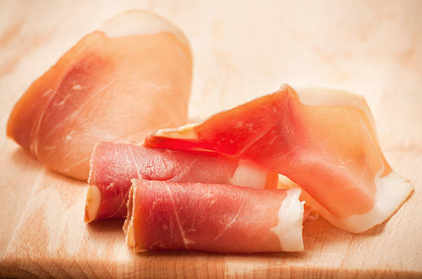 ham Prosciutto slices on cutting board parma ham stock pictures, royalty-free photos & images