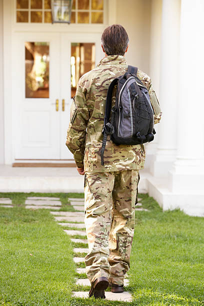 istock Back View Of Soldier Returning Home 175533592