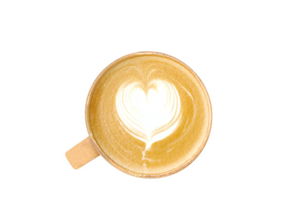 istock Hot latte coffee with an art heart shape in a brown ceramic mug isolated on a white background. 1755335954