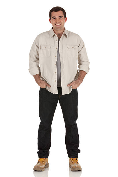 istock Happy man standing with his hands in pockets 175533960