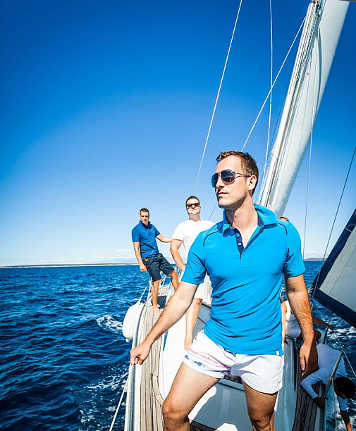 istock Caucasian man posing on the sailboat 175534069